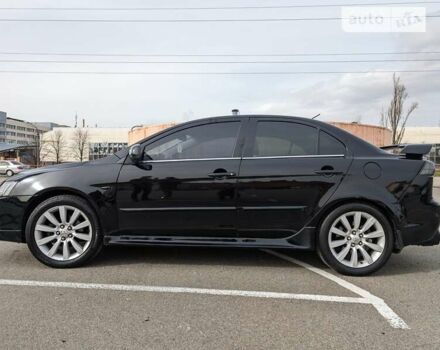 Черный Мицубиси Лансер, объемом двигателя 2 л и пробегом 240 тыс. км за 10000 $, фото 6 на Automoto.ua