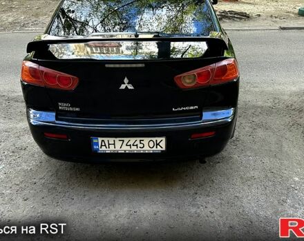 Мицубиси Лансер 2008 в Полтаве на Automoto.ua Черный Мицубиси Лансер, объемом двигателя 2 л и пробегом 284 тыс. км за 6300 $, фото 9 на Automoto.ua