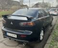Черный Мицубиси Лансер, объемом двигателя 2 л и пробегом 270 тыс. км за 5600 $, фото 8 на Automoto.ua