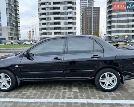 Чорний Міцубісі Lancer, об'ємом двигуна 1.6 л та пробігом 300 тис. км за 5500 $, фото 9 на Automoto.ua