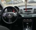 Чорний Міцубісі Lancer, об'ємом двигуна 2 л та пробігом 236 тис. км за 7900 $, фото 7 на Automoto.ua