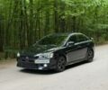Чорний Міцубісі Lancer, об'ємом двигуна 2 л та пробігом 227 тис. км за 7800 $, фото 1 на Automoto.ua