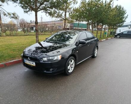 Черный Мицубиси Лансер, объемом двигателя 2 л и пробегом 200 тыс. км за 5100 $, фото 7 на Automoto.ua