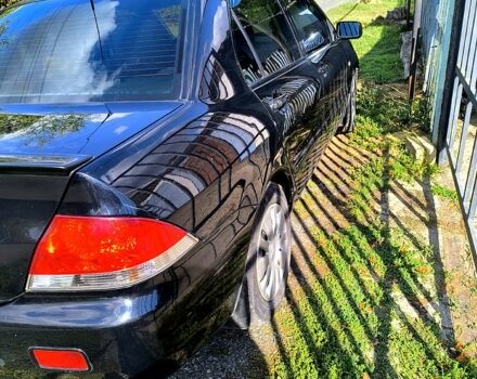 Черный Мицубиси Лансер, объемом двигателя 1.6 л и пробегом 232 тыс. км за 4400 $, фото 6 на Automoto.ua