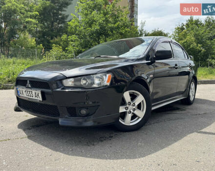 Черный Мицубиси Лансер, объемом двигателя 2 л и пробегом 234 тыс. км за 7400 $, фото 1 на Automoto.ua