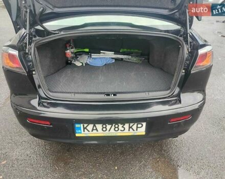 Черный Мицубиси Лансер, объемом двигателя 2 л и пробегом 229 тыс. км за 7300 $, фото 15 на Automoto.ua