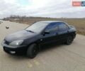 Черный Мицубиси Лансер, объемом двигателя 1.6 л и пробегом 255 тыс. км за 4700 $, фото 1 на Automoto.ua