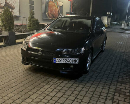 Черный Мицубиси Лансер, объемом двигателя 2 л и пробегом 270 тыс. км за 5400 $, фото 7 на Automoto.ua