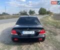 Черный Мицубиси Лансер, объемом двигателя 1.58 л и пробегом 193 тыс. км за 4000 $, фото 7 на Automoto.ua