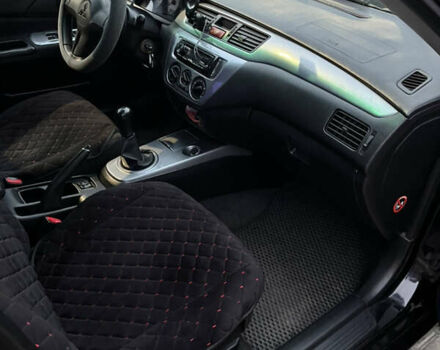 Чорний Міцубісі Lancer, об'ємом двигуна 1.6 л та пробігом 277 тис. км за 3900 $, фото 4 на Automoto.ua