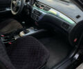 Чорний Міцубісі Lancer, об'ємом двигуна 1.6 л та пробігом 277 тис. км за 3900 $, фото 4 на Automoto.ua