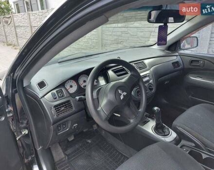 Чорний Міцубісі Lancer, об'ємом двигуна 1.6 л та пробігом 215 тис. км за 4900 $, фото 10 на Automoto.ua