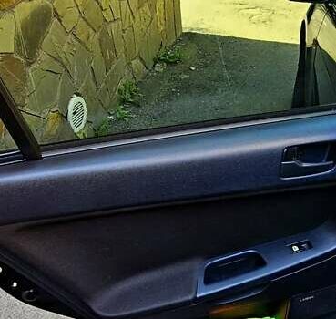 Черный Мицубиси Лансер, объемом двигателя 1.5 л и пробегом 205 тыс. км за 6300 $, фото 13 на Automoto.ua