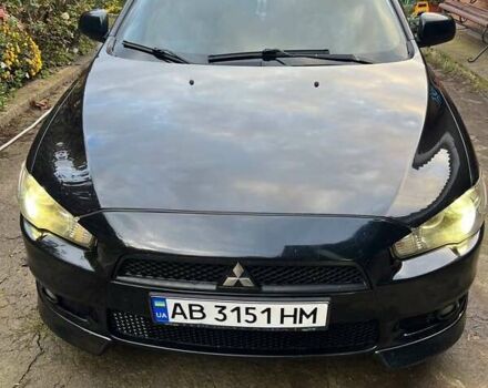 Черный Мицубиси Лансер, объемом двигателя 2 л и пробегом 214 тыс. км за 6300 $, фото 7 на Automoto.ua