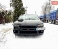 Черный Мицубиси Лансер, объемом двигателя 2 л и пробегом 208 тыс. км за 9500 $, фото 1 на Automoto.ua