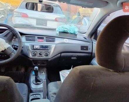 Черный Мицубиси Лансер, объемом двигателя 1.6 л и пробегом 200 тыс. км за 2000 $, фото 9 на Automoto.ua