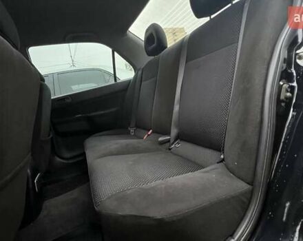 Чорний Міцубісі Lancer, об'ємом двигуна 1.6 л та пробігом 340 тис. км за 6190 $, фото 9 на Automoto.ua