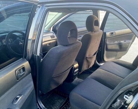 Чорний Міцубісі Lancer, об'ємом двигуна 1.6 л та пробігом 375 тис. км за 4899 $, фото 7 на Automoto.ua