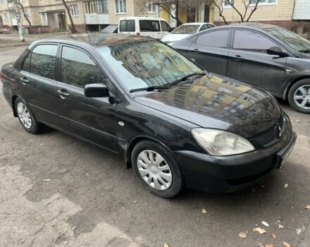Чорний Міцубісі Lancer, об'ємом двигуна 1.6 л та пробігом 250 тис. км за 3900 $, фото 6 на Automoto.ua