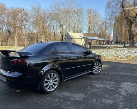 Черный Мицубиси Лансер, объемом двигателя 2 л и пробегом 236 тыс. км за 6550 $, фото 4 на Automoto.ua