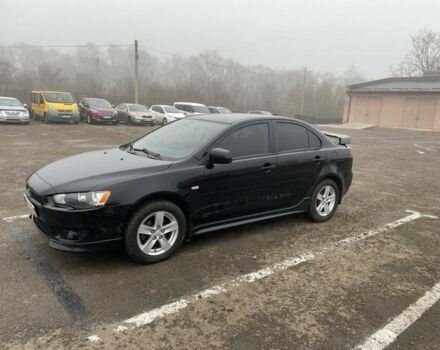 Чорний Міцубісі Lancer, об'ємом двигуна 2 л та пробігом 194 тис. км за 7300 $, фото 7 на Automoto.ua