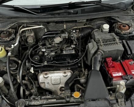 Черный Мицубиси Лансер, объемом двигателя 1.6 л и пробегом 168 тыс. км за 3700 $, фото 18 на Automoto.ua