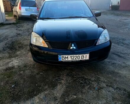 Черный Мицубиси Лансер, объемом двигателя 1.6 л и пробегом 230 тыс. км за 4700 $, фото 2 на Automoto.ua