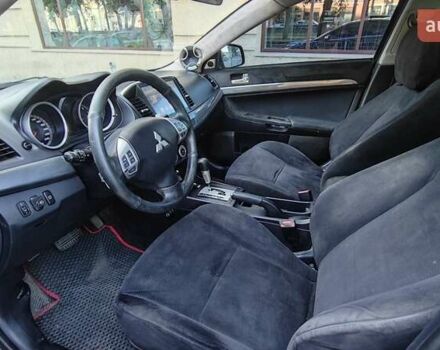 Черный Мицубиси Лансер, объемом двигателя 2 л и пробегом 240 тыс. км за 10000 $, фото 17 на Automoto.ua