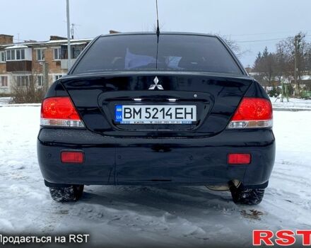 Чорний Міцубісі Lancer, об'ємом двигуна 1.6 л та пробігом 245 тис. км за 5600 $, фото 5 на Automoto.ua