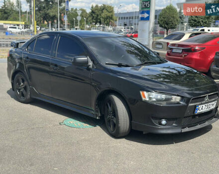 Черный Мицубиси Лансер, объемом двигателя 2 л и пробегом 295 тыс. км за 7000 $, фото 2 на Automoto.ua