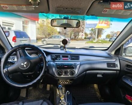 Черный Мицубиси Лансер, объемом двигателя 1.6 л и пробегом 358 тыс. км за 4300 $, фото 11 на Automoto.ua