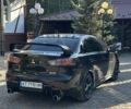 Черный Мицубиси Лансер, объемом двигателя 2 л и пробегом 188 тыс. км за 6900 $, фото 22 на Automoto.ua