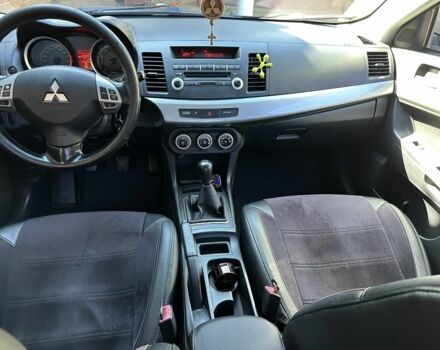 Чорний Міцубісі Lancer, об'ємом двигуна 2 л та пробігом 230 тис. км за 6650 $, фото 22 на Automoto.ua