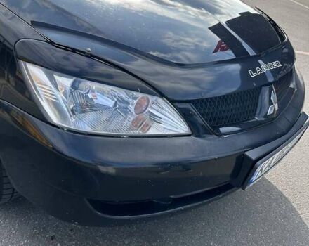 Чорний Міцубісі Lancer, об'ємом двигуна 1.6 л та пробігом 310 тис. км за 3500 $, фото 3 на Automoto.ua