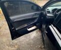 Черный Мицубиси Лансер, объемом двигателя 1.5 л и пробегом 255 тыс. км за 5000 $, фото 1 на Automoto.ua