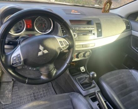 Черный Мицубиси Лансер, объемом двигателя 2 л и пробегом 190 тыс. км за 3100 $, фото 4 на Automoto.ua