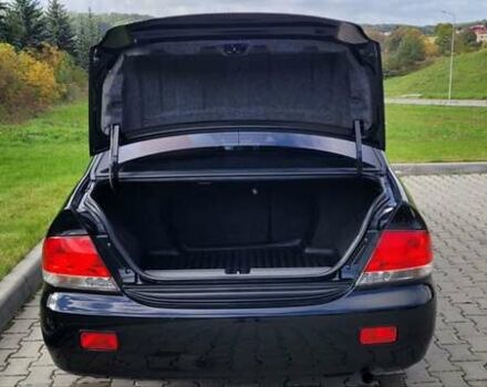 Міцубісі Lancer 2008 у Тернополі на Automoto.ua Чорний Міцубісі Lancer, об'ємом двигуна 1.58 л та пробігом 182 тис. км за 5600 $, фото 12 на Automoto.ua