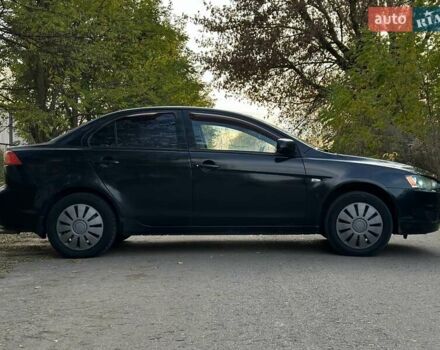 Черный Мицубиси Лансер, объемом двигателя 1.5 л и пробегом 285 тыс. км за 4800 $, фото 9 на Automoto.ua