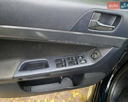 Чорний Міцубісі Lancer, об'ємом двигуна 2 л та пробігом 237 тис. км за 7500 $, фото 15 на Automoto.ua