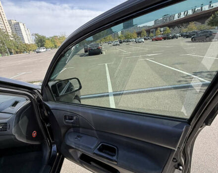 Черный Мицубиси Лансер, объемом двигателя 1.6 л и пробегом 321 тыс. км за 5000 $, фото 33 на Automoto.ua