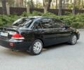 Чорний Міцубісі Lancer, об'ємом двигуна 1.6 л та пробігом 300 тис. км за 4600 $, фото 10 на Automoto.ua