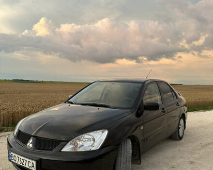 Чорний Міцубісі Lancer, об'ємом двигуна 1.58 л та пробігом 232 тис. км за 4300 $, фото 8 на Automoto.ua