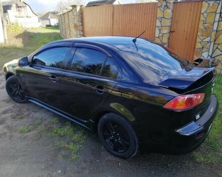 Міцубісі Lancer 2008 у Києві на Automoto.ua Чорний Міцубісі Lancer, об'ємом двигуна 2 л та пробігом 196 тис. км за 5500 $, фото 2 на Automoto.ua