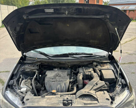 Чорний Міцубісі Lancer, об'ємом двигуна 1.5 л та пробігом 210 тис. км за 5500 $, фото 34 на Automoto.ua