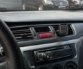 Черный Мицубиси Лансер, объемом двигателя 1.6 л и пробегом 279 тыс. км за 4690 $, фото 22 на Automoto.ua