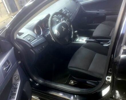 Чорний Міцубісі Lancer, об'ємом двигуна 2 л та пробігом 126 тис. км за 5800 $, фото 5 на Automoto.ua