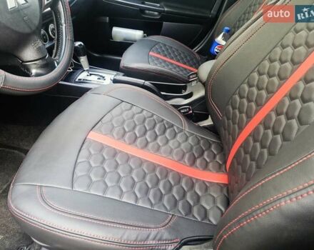 Чорний Міцубісі Lancer, об'ємом двигуна 2 л та пробігом 240 тис. км за 7850 $, фото 26 на Automoto.ua