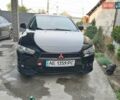 Черный Мицубиси Лансер, объемом двигателя 2 л и пробегом 290 тыс. км за 6800 $, фото 1 на Automoto.ua