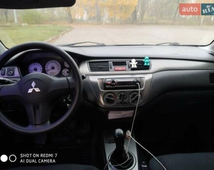 Мицубиси Лансер 2008 в Прилуках на Automoto.ua Черный Мицубиси Лансер, объемом двигателя 1.58 л и пробегом 219 тыс. км за 4900 $, фото 1 на Automoto.ua