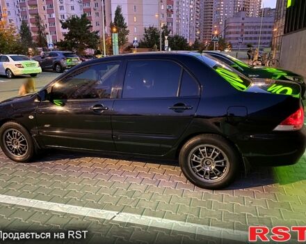 Чорний Міцубісі Lancer, об'ємом двигуна 1.6 л та пробігом 280 тис. км за 4700 $, фото 1 на Automoto.ua